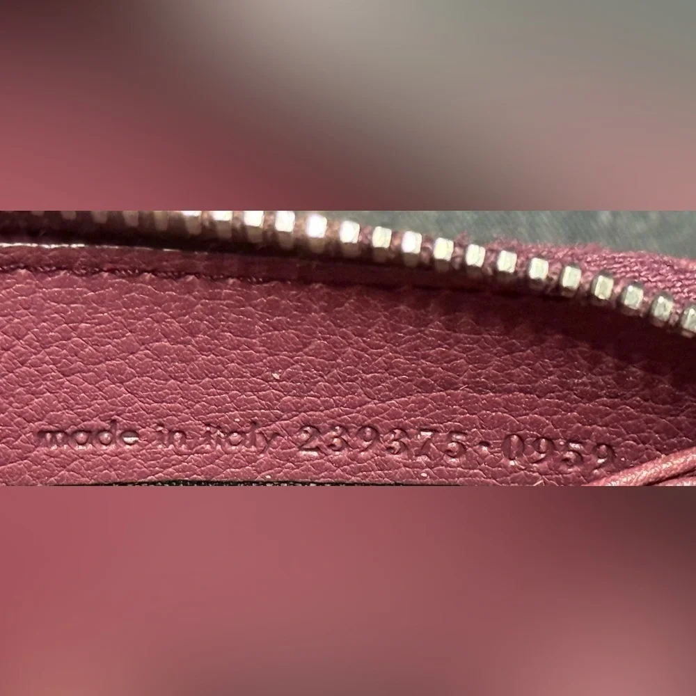 YSL pink Cassandra studded zip around wallet